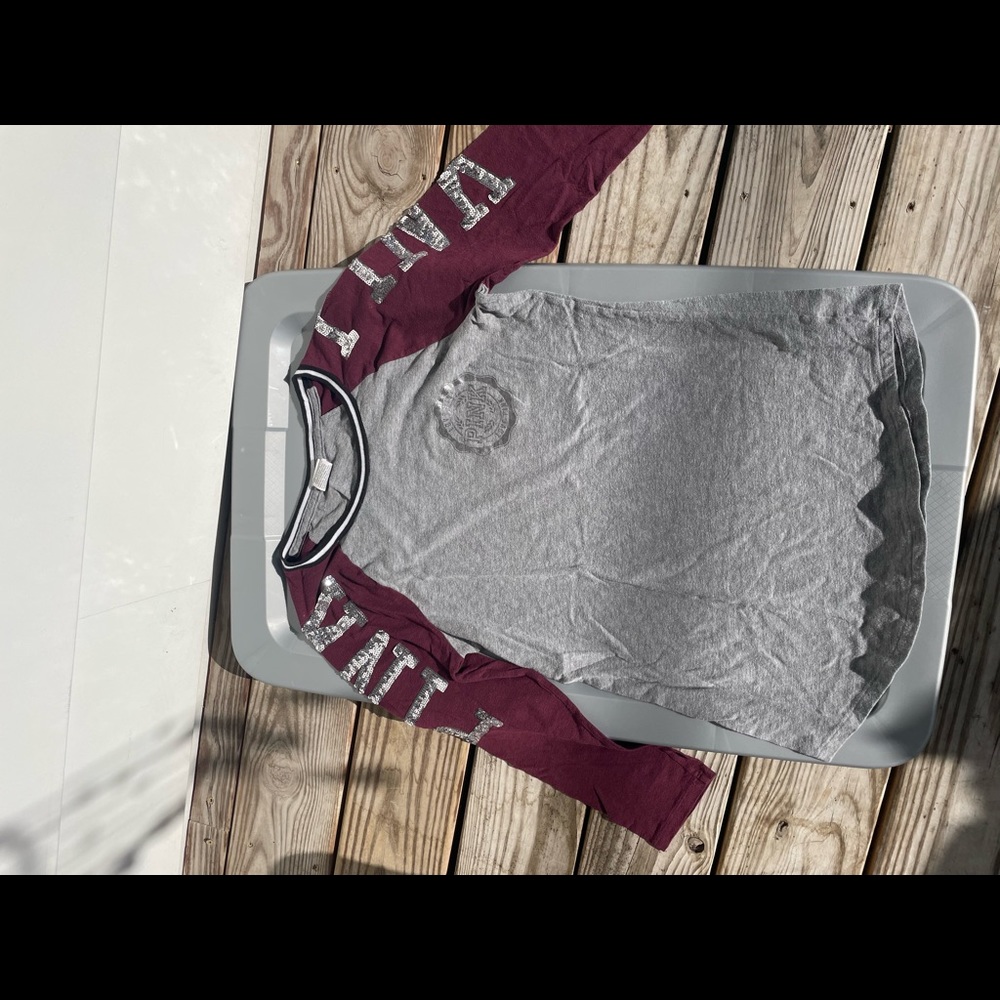 Pink size medium mid-long sleeve shirt.